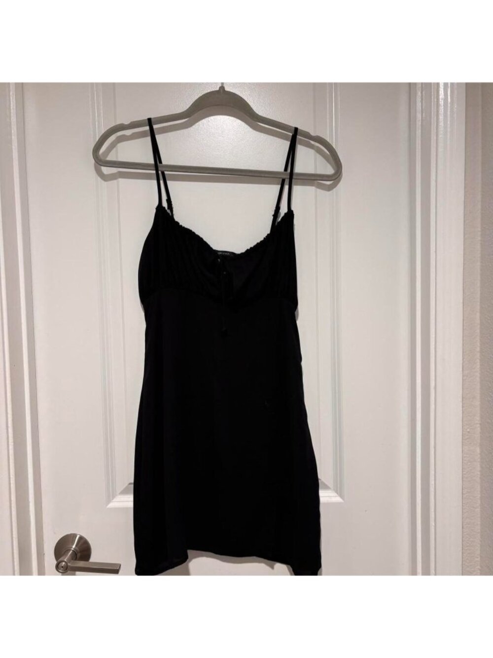 Black LBD Forever 21 mini dress with adjustable straps and tie front detail